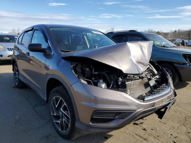 Photo 3 VIN: 2HKRM4H40GH667304 - HONDA CR-V SE 