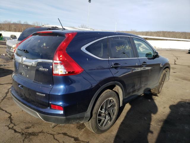 Photo 3 VIN: 2HKRM4H40GH696236 - HONDA CR-V SE 