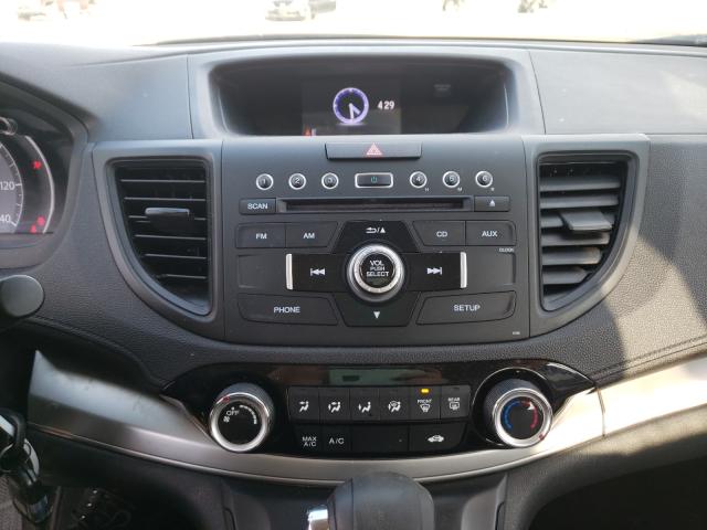 Photo 8 VIN: 2HKRM4H40GH696236 - HONDA CR-V SE 