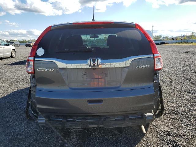 Photo 5 VIN: 2HKRM4H41FH102719 - HONDA CR-V SE 