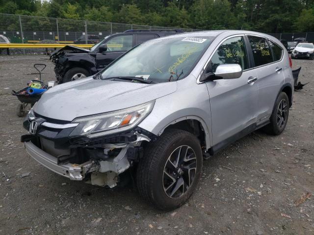 Photo 1 VIN: 2HKRM4H41GH661432 - HONDA CR-V SE 