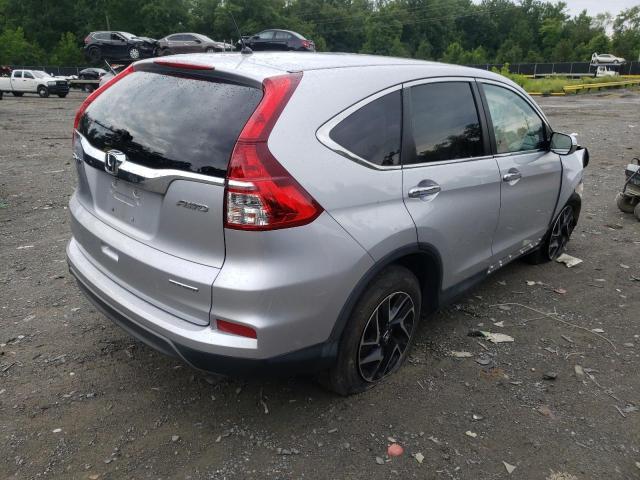 Photo 3 VIN: 2HKRM4H41GH661432 - HONDA CR-V SE 