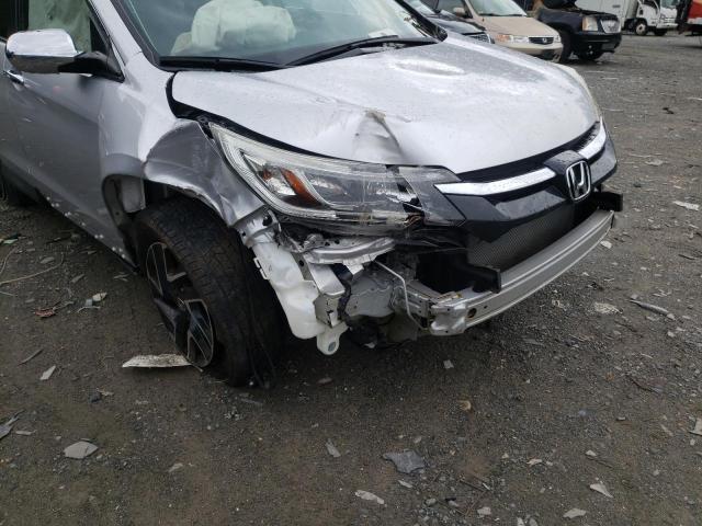 Photo 8 VIN: 2HKRM4H41GH661432 - HONDA CR-V SE 