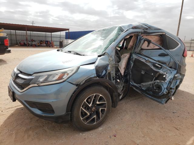 Photo 1 VIN: 2HKRM4H42GH628231 - HONDA CR-V SE 