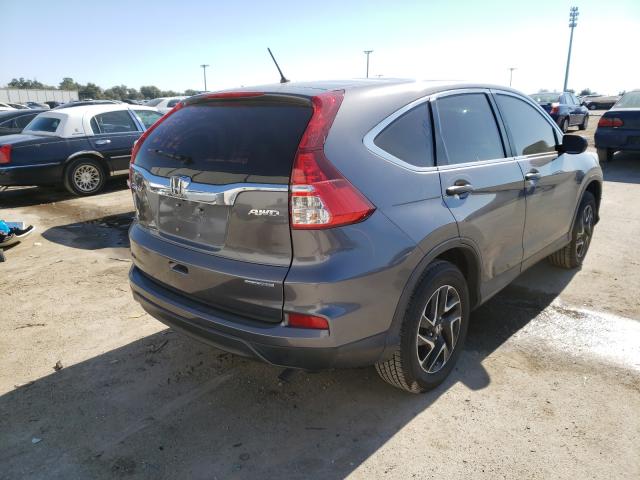 Photo 3 VIN: 2HKRM4H42GH667367 - HONDA CR-V SE 