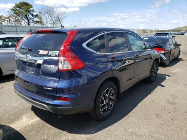 Photo 3 VIN: 2HKRM4H42GH674030 - HONDA CR-V SE 