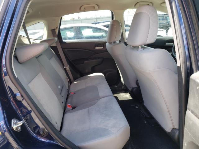 Photo 5 VIN: 2HKRM4H42GH674030 - HONDA CR-V SE 