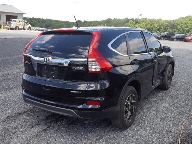 Photo 3 VIN: 2HKRM4H42GH682628 - HONDA CR-V SE 