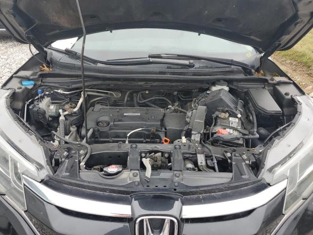 Photo 11 VIN: 2HKRM4H42GH692155 - HONDA CR-V SE 