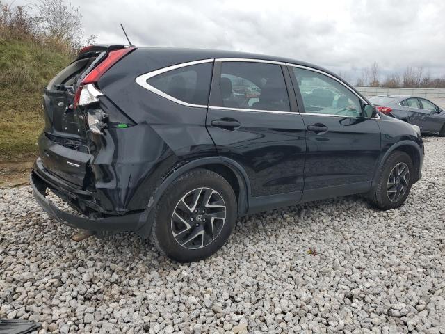 Photo 2 VIN: 2HKRM4H42GH692155 - HONDA CR-V SE 