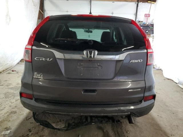 Photo 5 VIN: 2HKRM4H42GH697050 - HONDA CR-V SE 