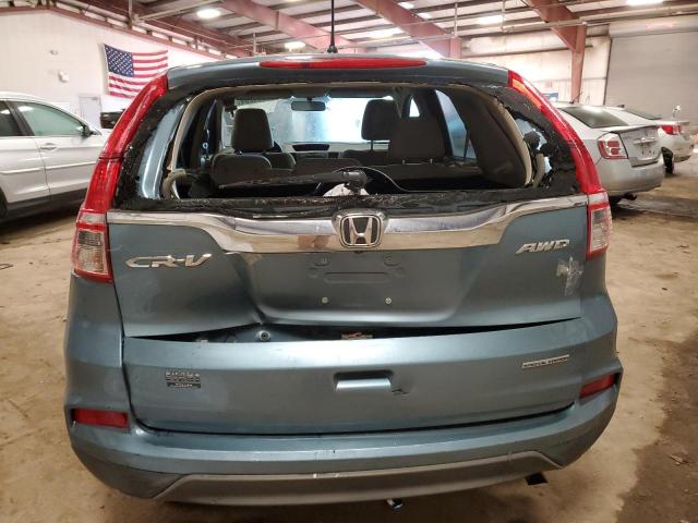 Photo 5 VIN: 2HKRM4H42GH699025 - HONDA CR-V SE 