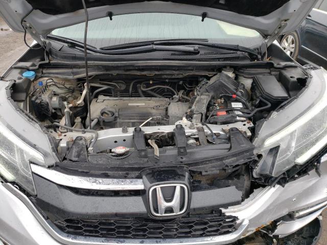 Photo 11 VIN: 2HKRM4H43GH124089 - HONDA CR-V SE 