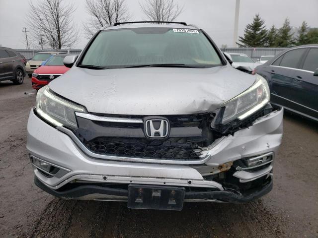 Photo 4 VIN: 2HKRM4H43GH124089 - HONDA CR-V SE 