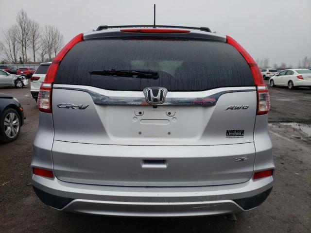 Photo 5 VIN: 2HKRM4H43GH124089 - HONDA CR-V SE 