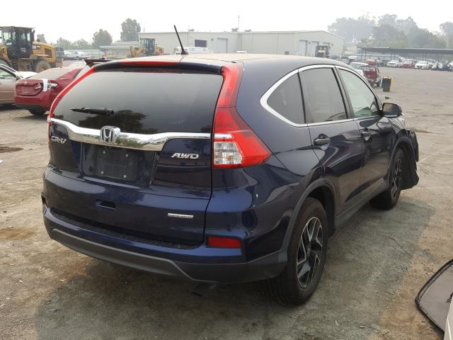 Photo 3 VIN: 2HKRM4H43GH636077 - HONDA CR-V SE 