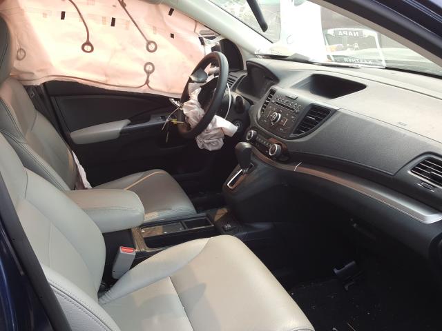 Photo 4 VIN: 2HKRM4H43GH636077 - HONDA CR-V SE 