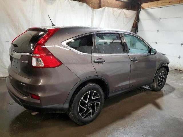 Photo 2 VIN: 2HKRM4H43GH702059 - HONDA CR-V SE 