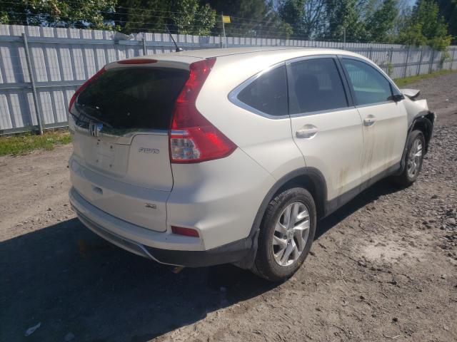 Photo 3 VIN: 2HKRM4H44GH107432 - HONDA CR-V SE 