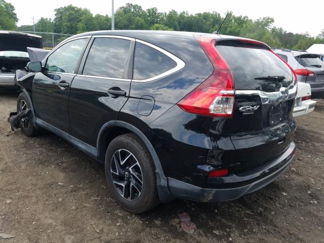 Photo 2 VIN: 2HKRM4H44GH611477 - HONDA CR-V SE 