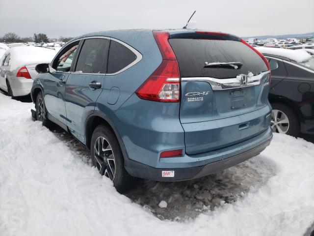 Photo 2 VIN: 2HKRM4H44GH656466 - HONDA CR-V SE 