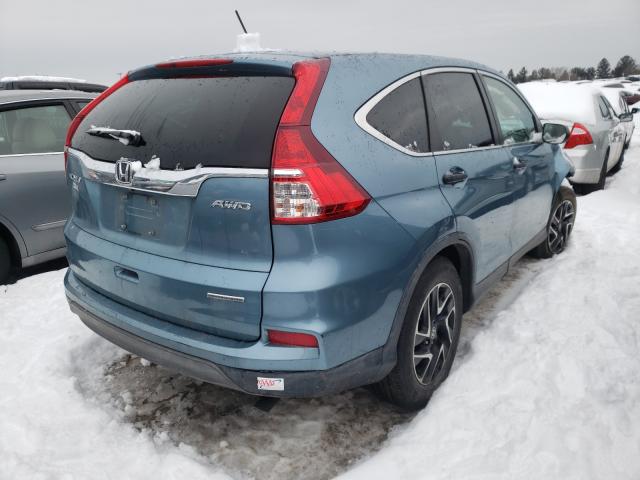 Photo 3 VIN: 2HKRM4H44GH656466 - HONDA CR-V SE 