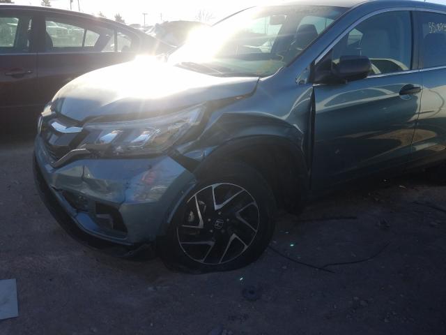 Photo 8 VIN: 2HKRM4H44GH690181 - HONDA CR-V SE 