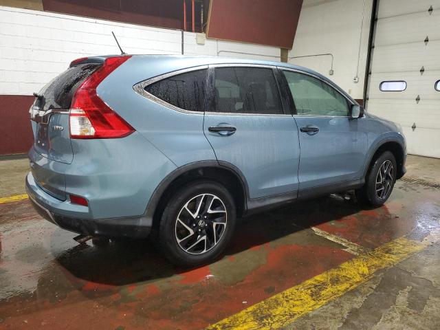 Photo 2 VIN: 2HKRM4H45GH628272 - HONDA CR-V SE 