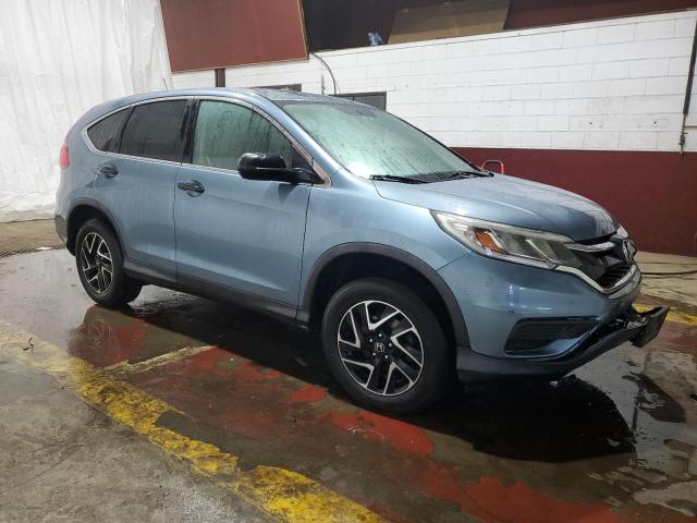 Photo 3 VIN: 2HKRM4H45GH628272 - HONDA CR-V SE 