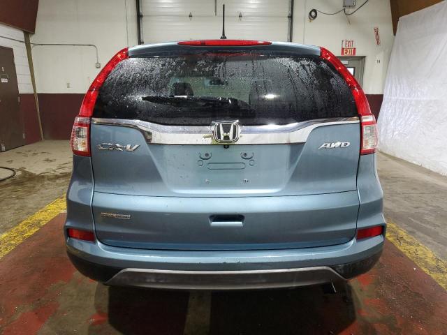 Photo 5 VIN: 2HKRM4H45GH628272 - HONDA CR-V SE 