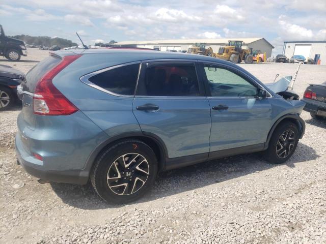 Photo 2 VIN: 2HKRM4H45GH636999 - HONDA CR-V SE 