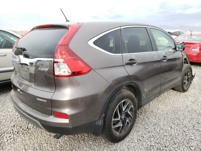 Photo 3 VIN: 2HKRM4H45GH668335 - HONDA CR-V SE 