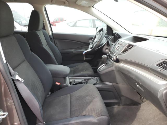 Photo 4 VIN: 2HKRM4H45GH668335 - HONDA CR-V SE 