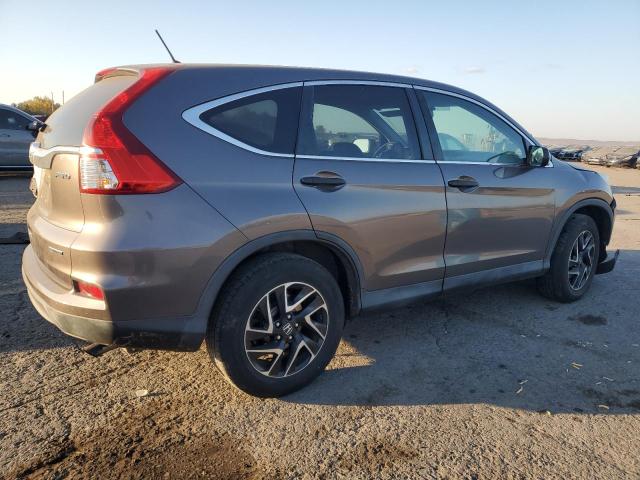 Photo 2 VIN: 2HKRM4H45GH672935 - HONDA CR-V SE 