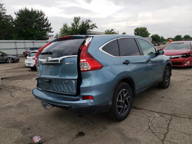 Photo 3 VIN: 2HKRM4H45GH676483 - HONDA CR-V SE 