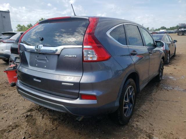 Photo 3 VIN: 2HKRM4H45GH706940 - HONDA CR-V SE 