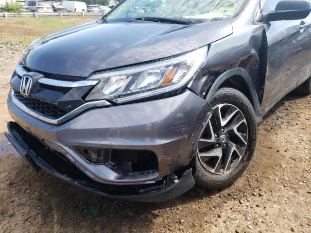 Photo 8 VIN: 2HKRM4H45GH706940 - HONDA CR-V SE 