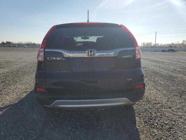 Photo 5 VIN: 2HKRM4H46FH126613 - HONDA CR-V SE 