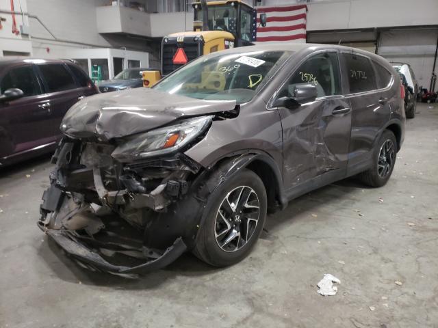 Photo 1 VIN: 2HKRM4H46GH714612 - HONDA CR-V SE 