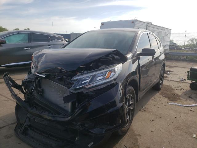 Photo 1 VIN: 2HKRM4H47GH675027 - HONDA CR-V SE 