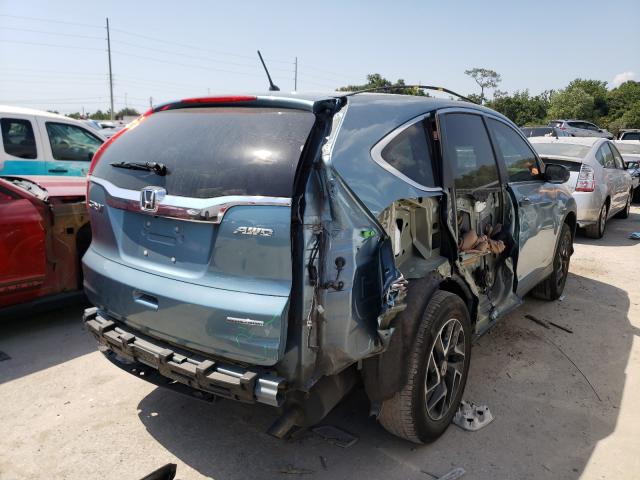 Photo 3 VIN: 2HKRM4H47GH682141 - HONDA CR-V SE 