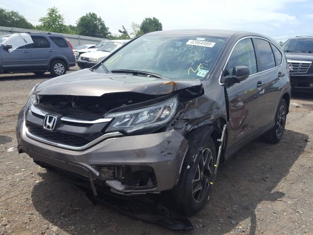 Photo 1 VIN: 2HKRM4H47GH702047 - HONDA CR-V SE 