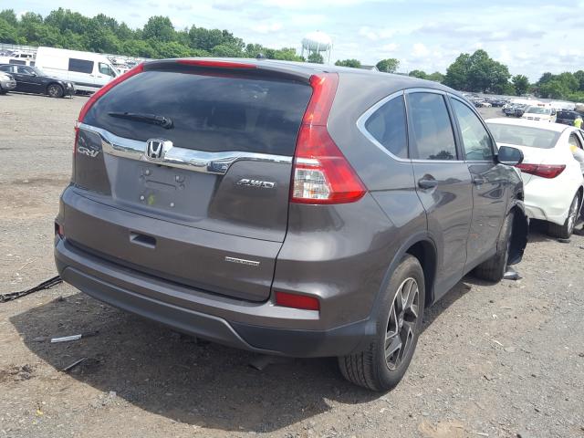 Photo 3 VIN: 2HKRM4H47GH702047 - HONDA CR-V SE 