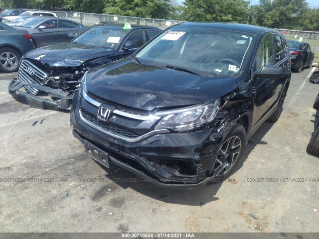 Photo 5 VIN: 2HKRM4H47GH709984 - HONDA CR-V 