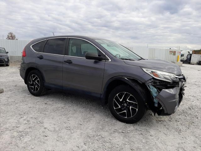 Photo 3 VIN: 2HKRM4H48GH614379 - HONDA CR-V SE 