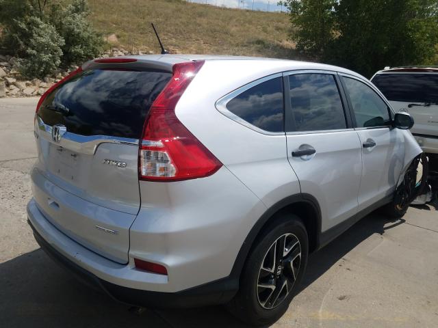 Photo 3 VIN: 2HKRM4H48GH672086 - HONDA CR-V SE 