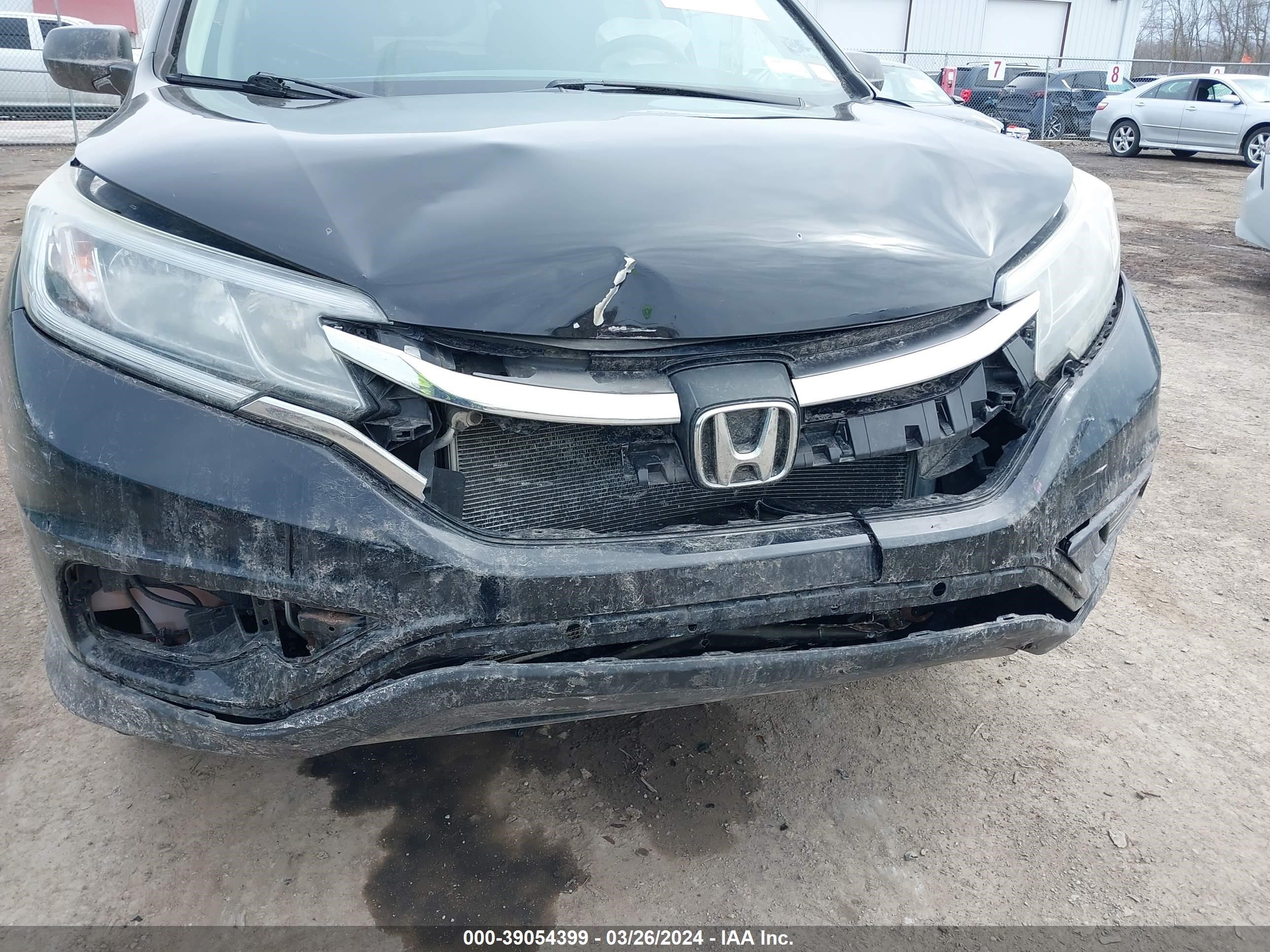 Photo 5 VIN: 2HKRM4H48GH709945 - HONDA CR-V 