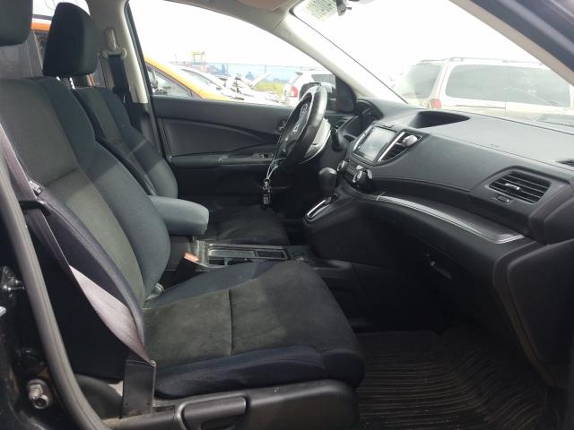 Photo 4 VIN: 2HKRM4H49FH124385 - HONDA CR-V SE 