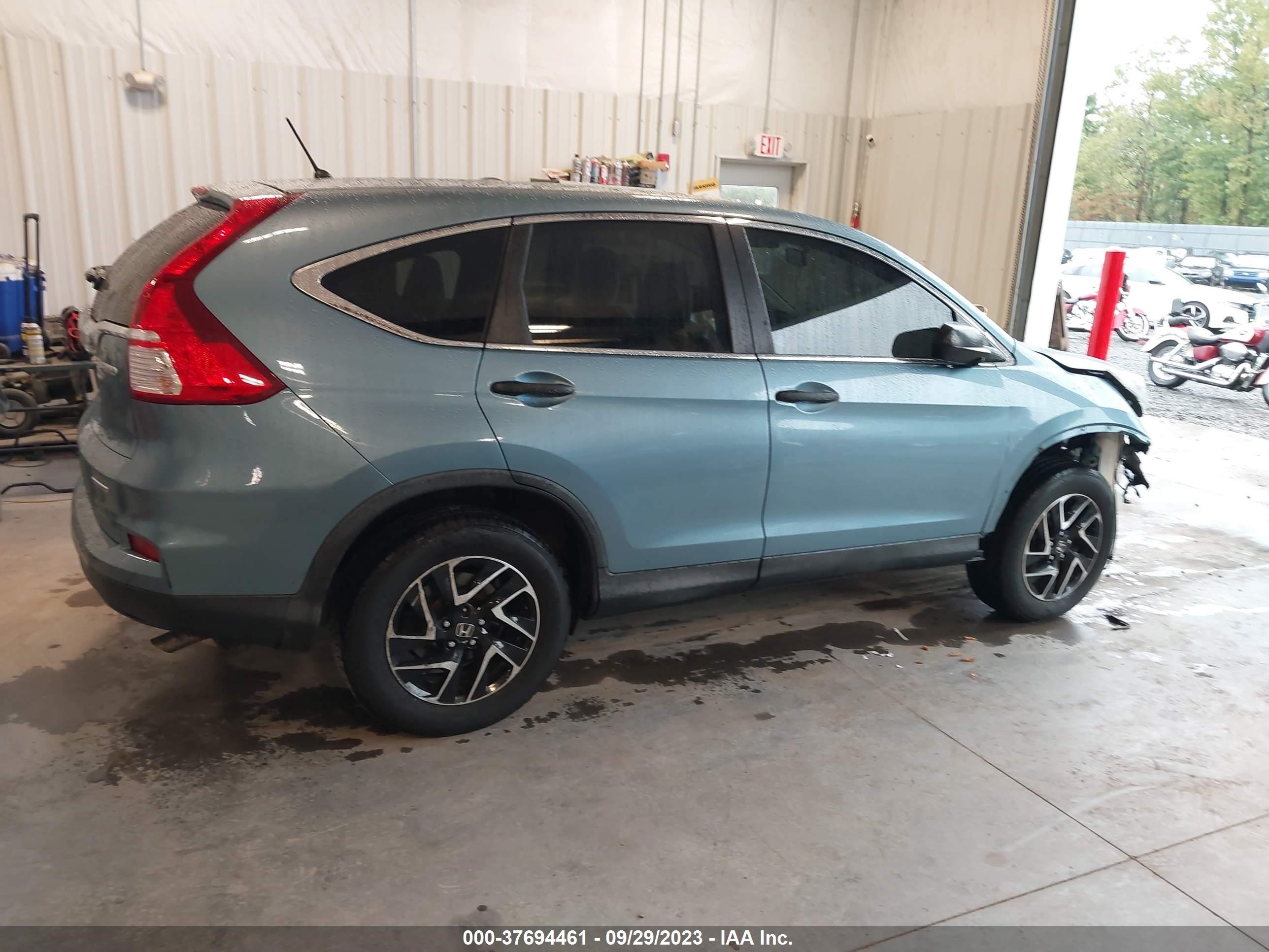 Photo 12 VIN: 2HKRM4H49GH690175 - HONDA CR-V 