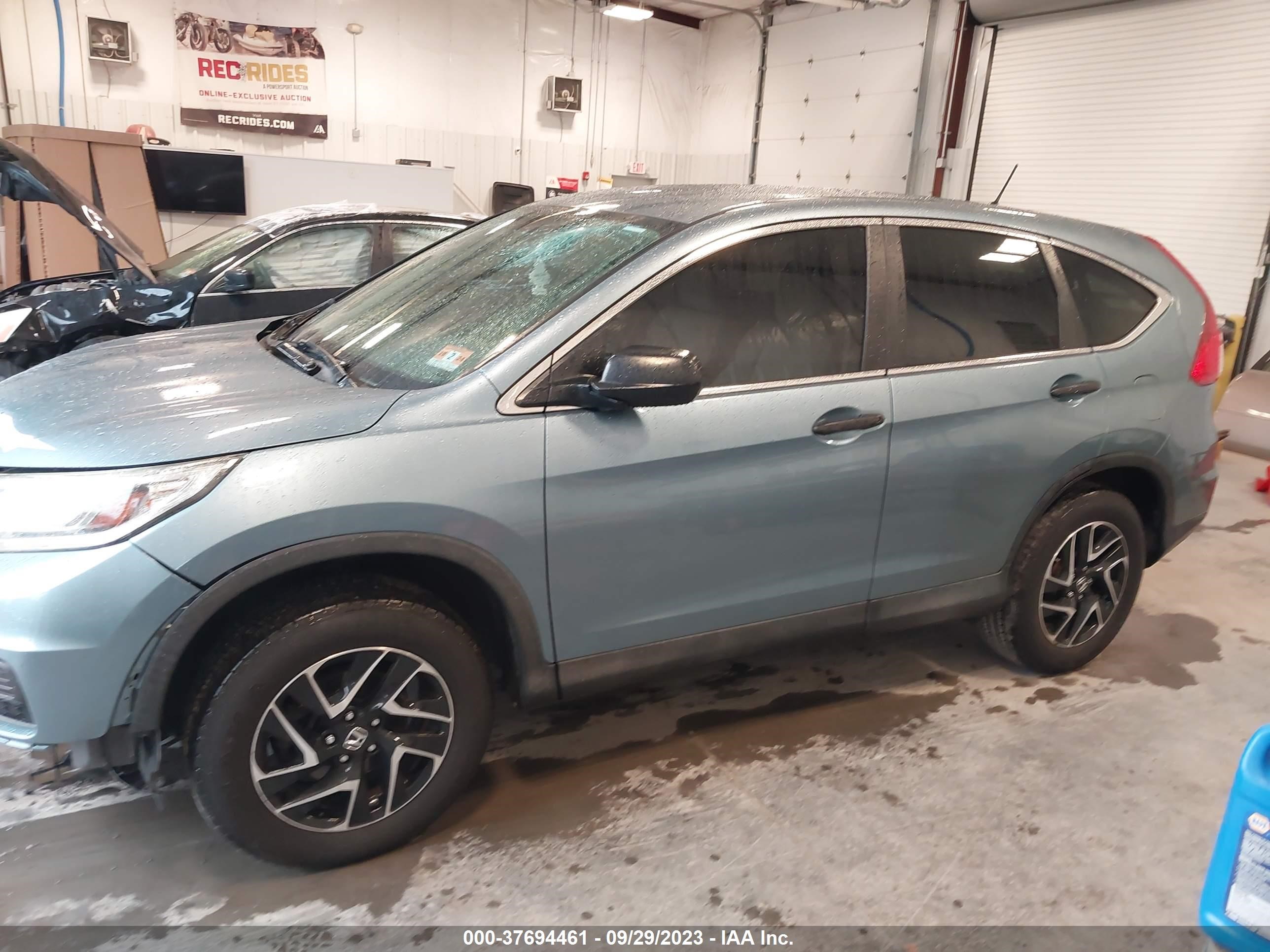 Photo 13 VIN: 2HKRM4H49GH690175 - HONDA CR-V 